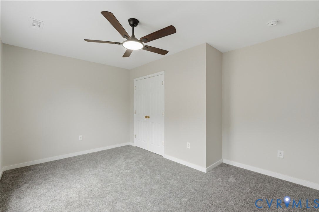 124 Lipscomb Street, Blackwell, Richmond, VA 23224 Neutral wall paint and plush carpeting