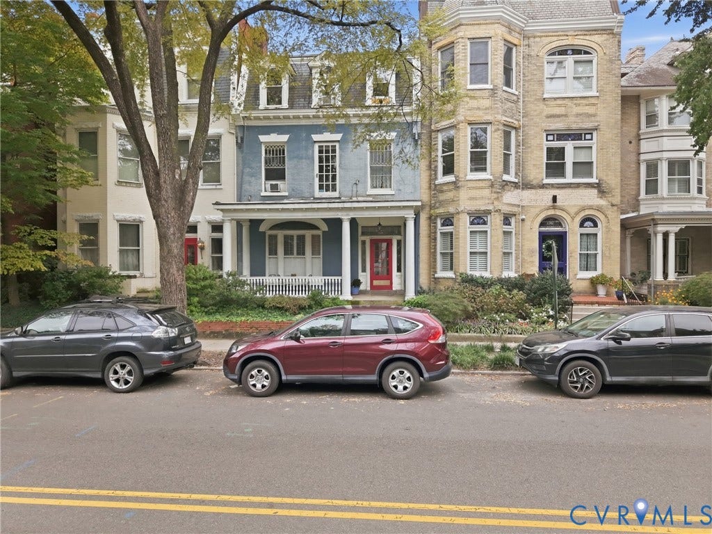 1505 Grove Avenue, Fan, Richmond, VA 23220 Faade featuring a bay window, arched entryways, and multiple levels of windows