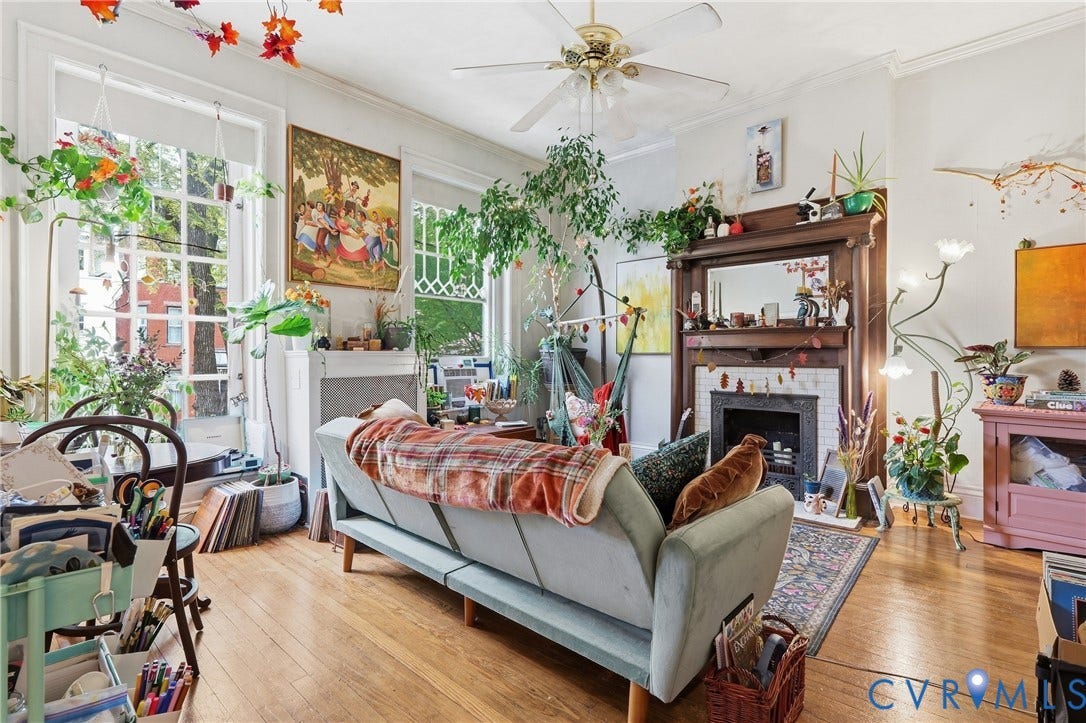 1505 Grove Avenue, Fan, Richmond, VA 23220 Hardwood flooring, decorative fireplace with marble surround, wood mantel, ceiling fan, and large windows