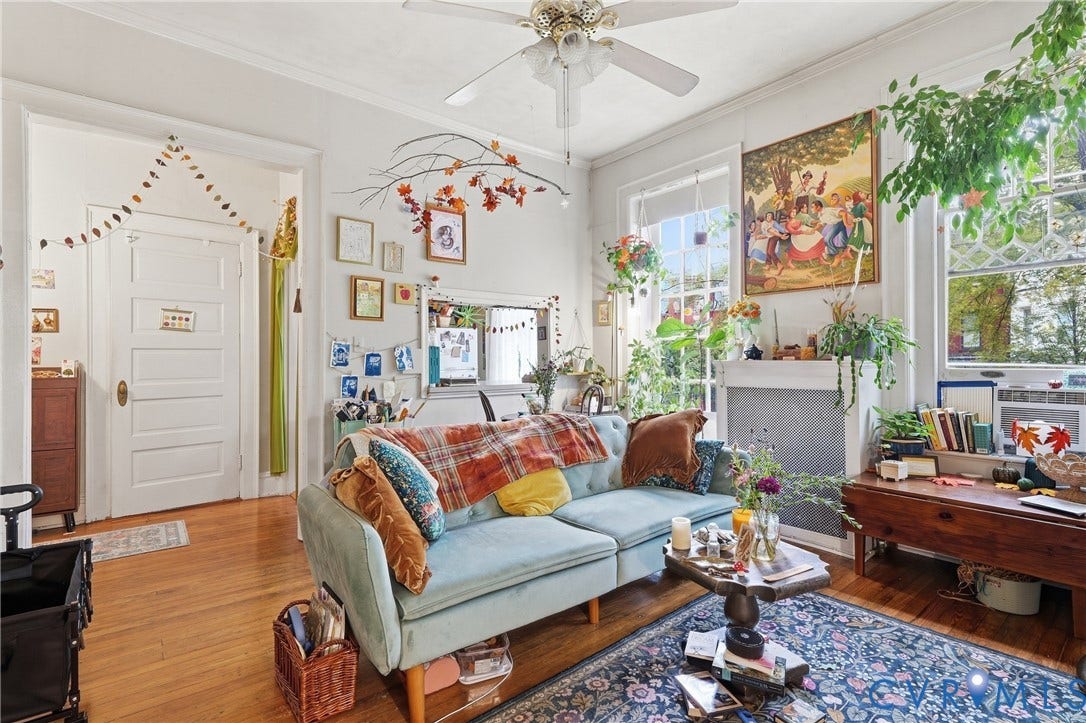 1505 Grove Avenue, Fan, Richmond, VA 23220 Hardwood flooring, painted paneled door, multiple windows, ceiling fan, and white trim