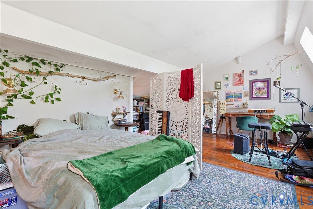 1505 Grove Avenue, Fan, Richmond, VA 23220 Vaulted ceiling, wood-finish flooring, and a decorative room divider
