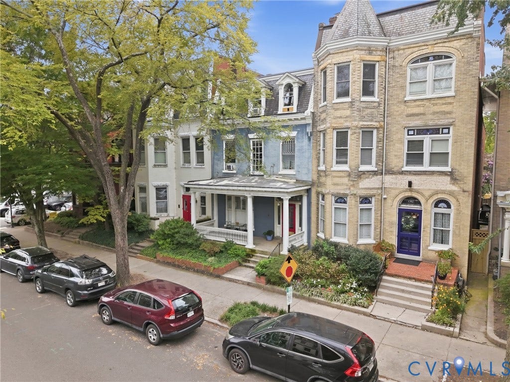 1505 Grove Avenue, Fan, Richmond, VA 23220 Brick exterior with a turret feature, arched windows, and a prominent front entrance