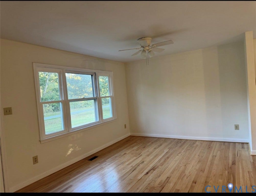 1605 Cartersville Road, Quiet, Goochland, VA 23063 Hardwood flooring, multi-pane window, ceiling fan, and painted walls