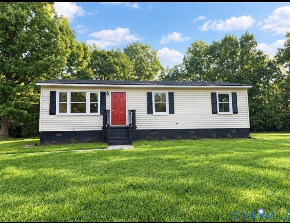 1605 Cartersville Road, Quiet, Goochland, VA 23063 Single-story home featuring light-colored siding, a vibrant red entry door, dark shutters, and a dark-toned front porch with stairs