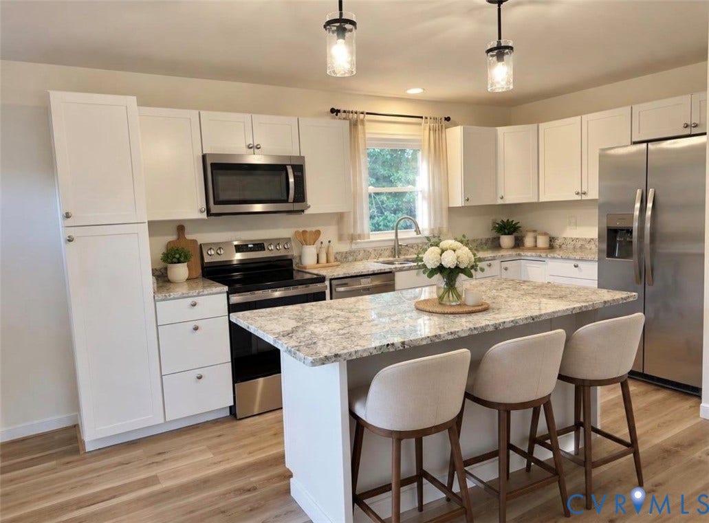1605 Cartersville Road, Quiet, Goochland, VA 23063 VIRTUALLY STAGED:
Kitchen featuring an island with stone countertops, white shaker cabinetry, stainless steel appliances, and wood-finish flooring