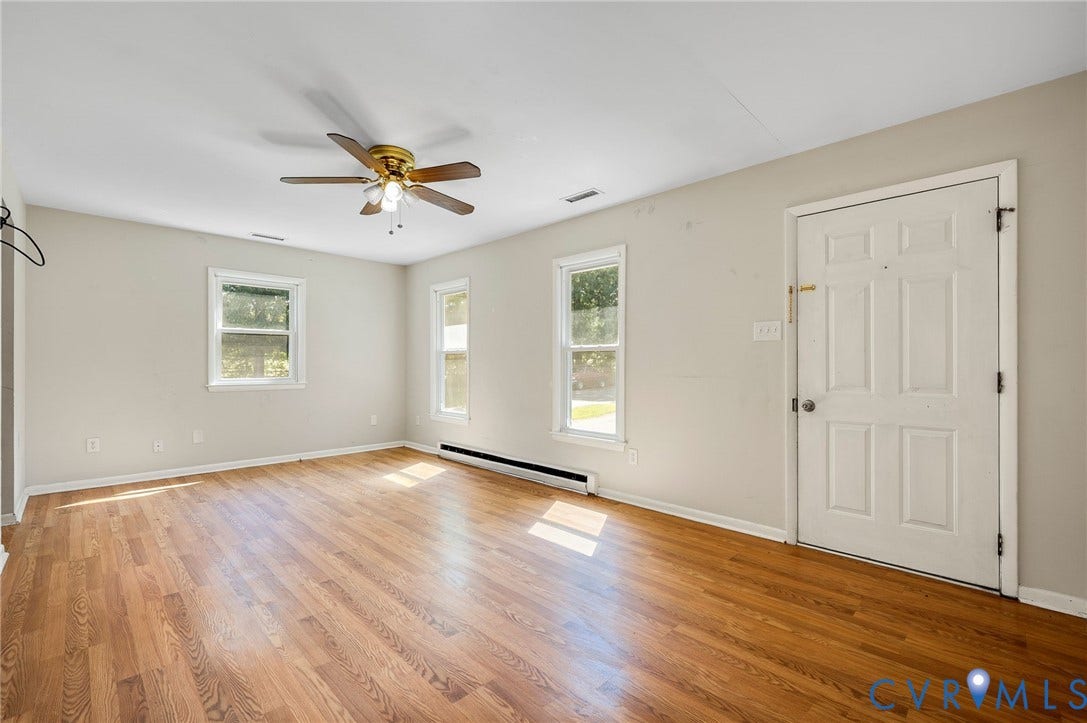3530 Glisson Road, Richmond, VA 23237 Hardwood flooring throughout, multiple windows, ceiling fan, and painted walls