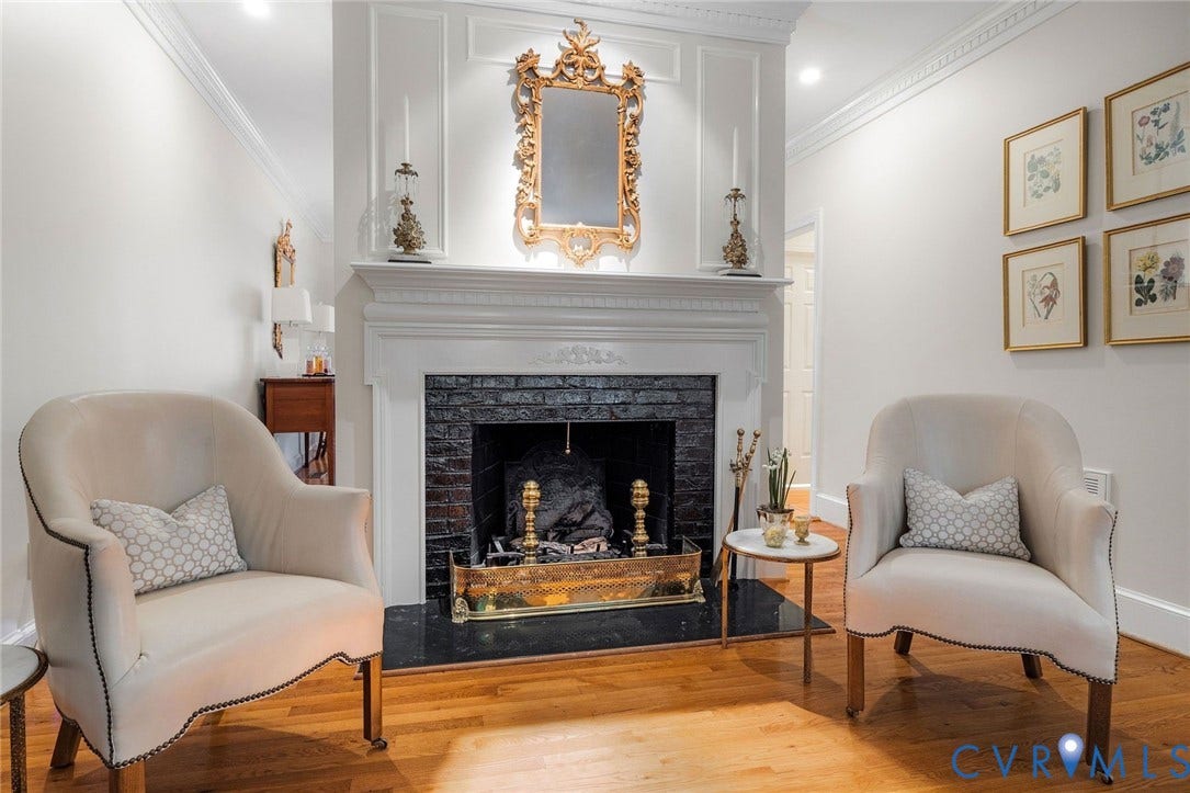 513 St Albans Way, Richmond, VA 23229 Fireplace is flanked by recently created openings to dining room