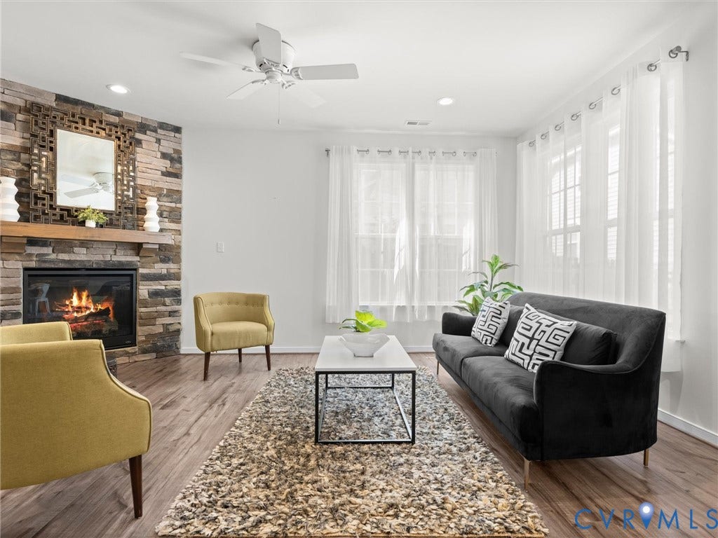 6728 Welara Run, Greenwich Walk At Fox Creek, Moseley, VA 23120 Abundant natural light and gas fireplace.