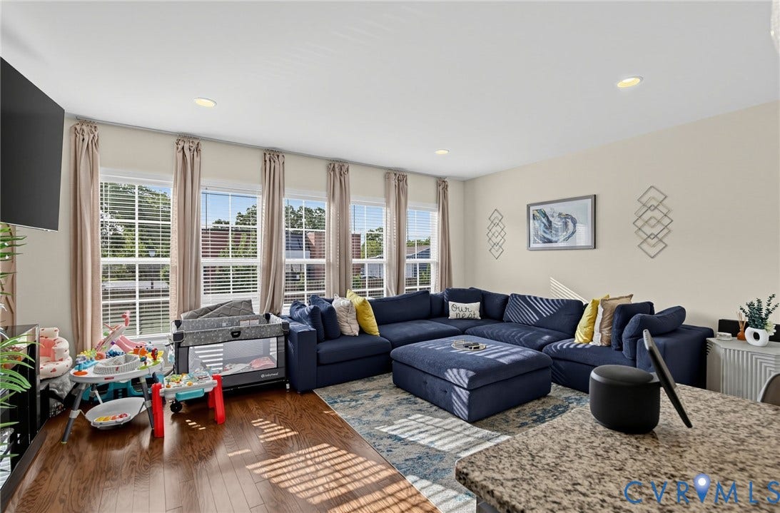 Recessed lighting and warm neutral wall tones