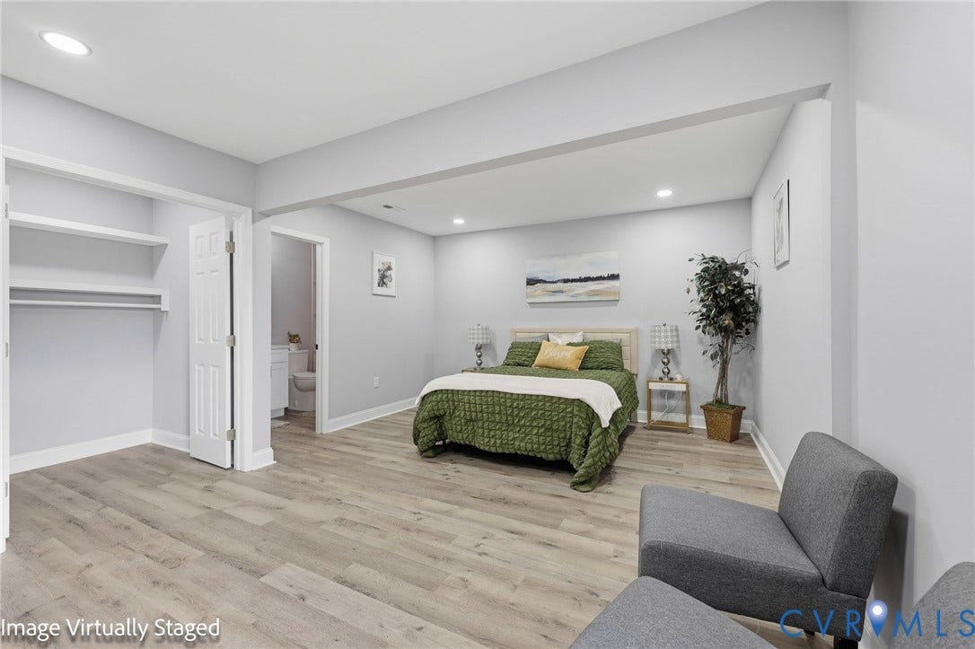 510 N Carolina Avenue, Petersburg, VA 23803 Recessed lighting illuminates the room with wood-finish flooring