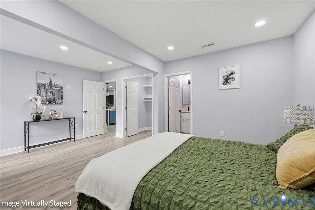 510 N Carolina Avenue, Petersburg, VA 23803 Recessed lighting, wood-finish flooring, white paneled doors, and built-in shelving