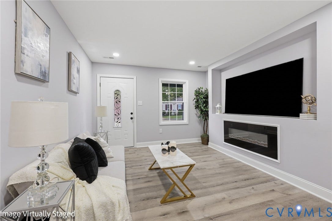 510 N Carolina Avenue, Petersburg, VA 23803 Recessed wall feature with an integrated fireplace and television alcove