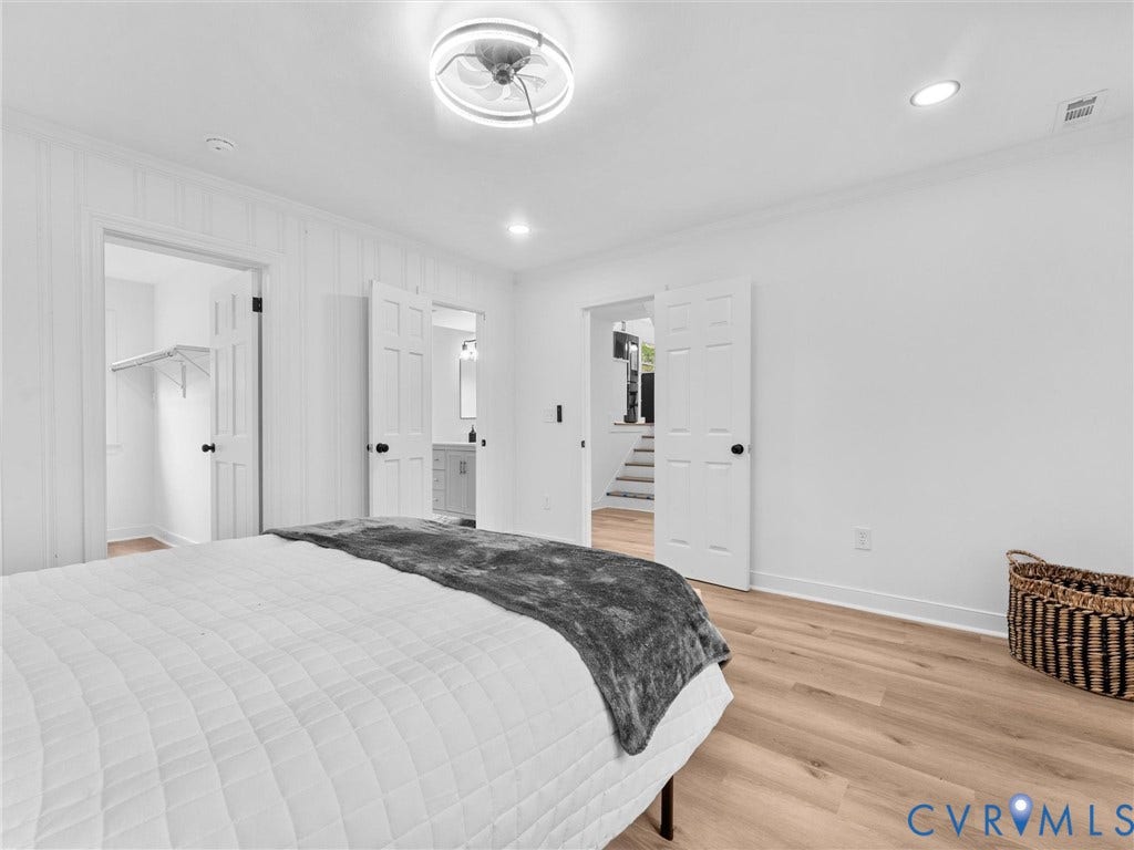 7361 Creekridge Road, Henrico, VA 23231 Wood-finish flooring, recessed lighting, ceiling light fixture, panel doors, and built-in closet shelving