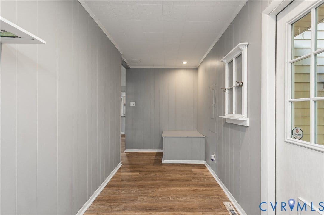 300 Gunby Drive, Henrico, VA 23229 Entryway featuring wood-finish flooring, vertical paneling, recessed lighting, and a built-in bench