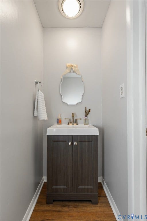 300 Gunby Drive, Henrico, VA 23229 Wood-finish flooring with white baseboards