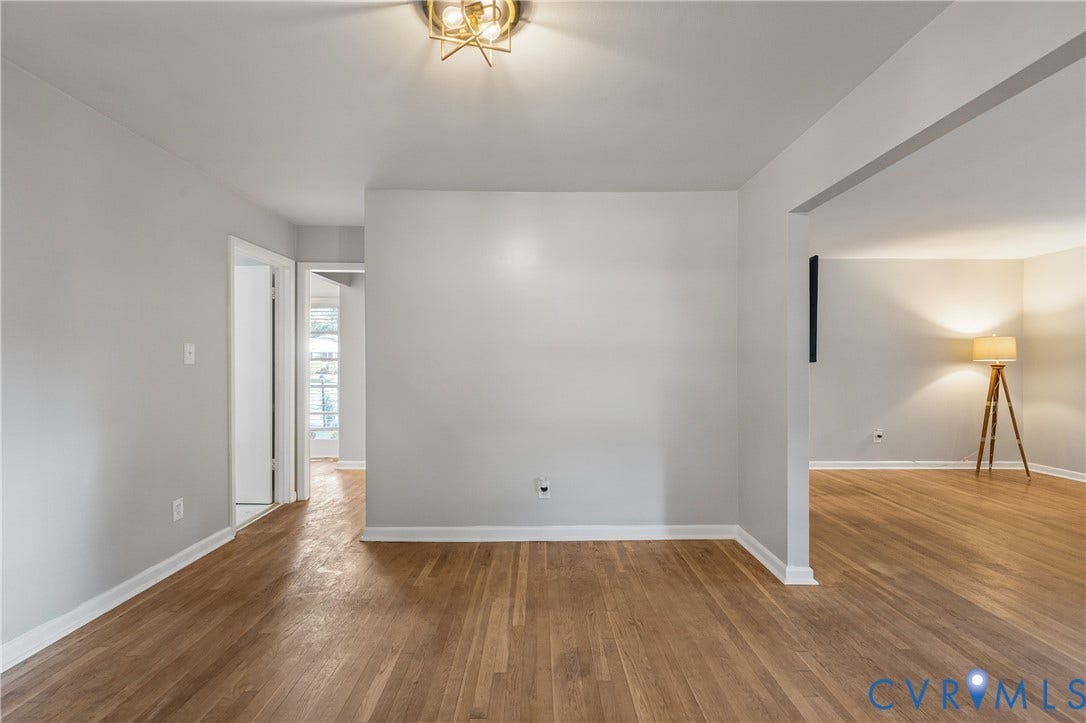 300 Gunby Drive, Henrico, VA 23229 Hardwood flooring throughout, recessed entryway, and a contemporary ceiling light fixture