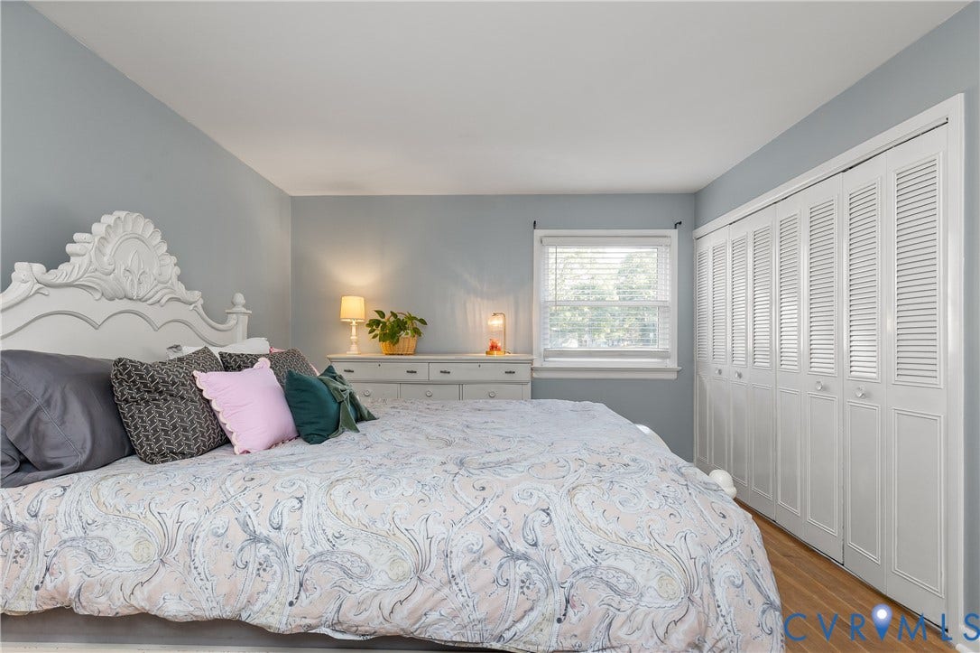 300 Gunby Drive, Henrico, VA 23229 Wood-finish flooring, single window, and white louvered bifold closet doors