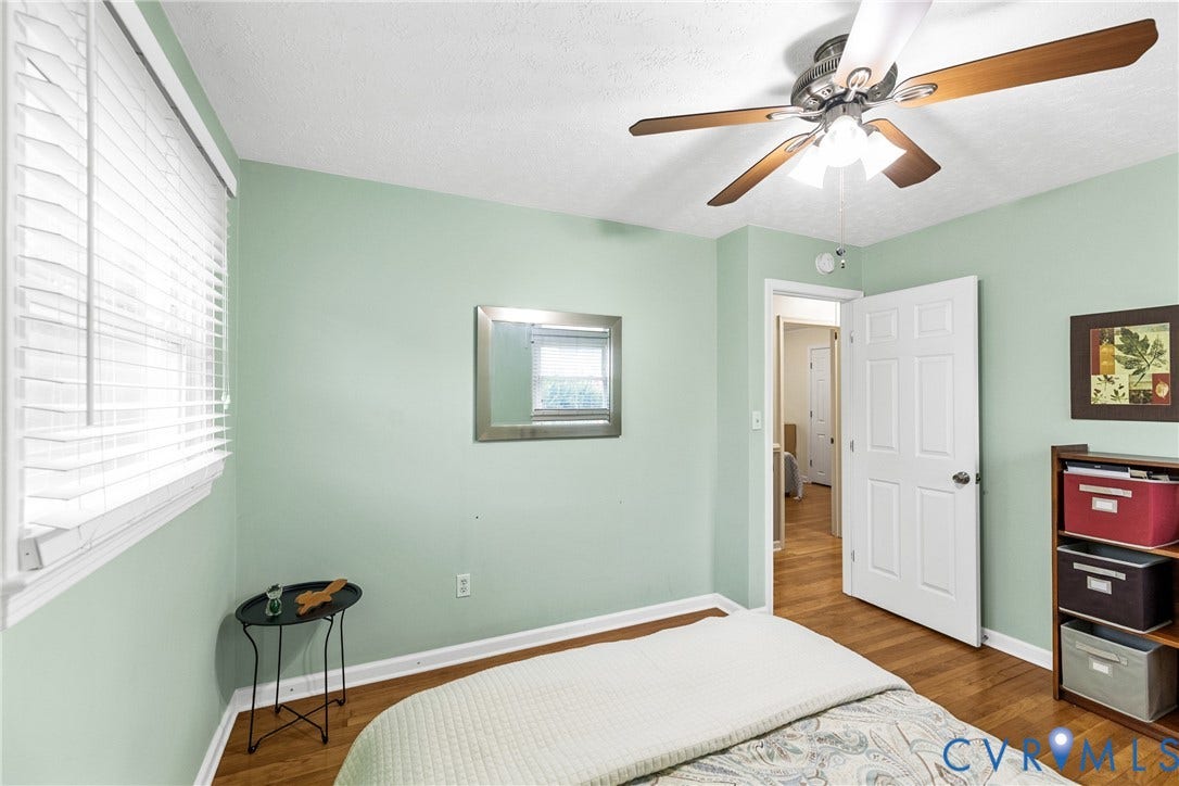 822 Old Town Drive, Colonial Heights, VA 23834 Wood-finish flooring, ceiling fan with integrated lighting, window with blinds, and paneled interior door