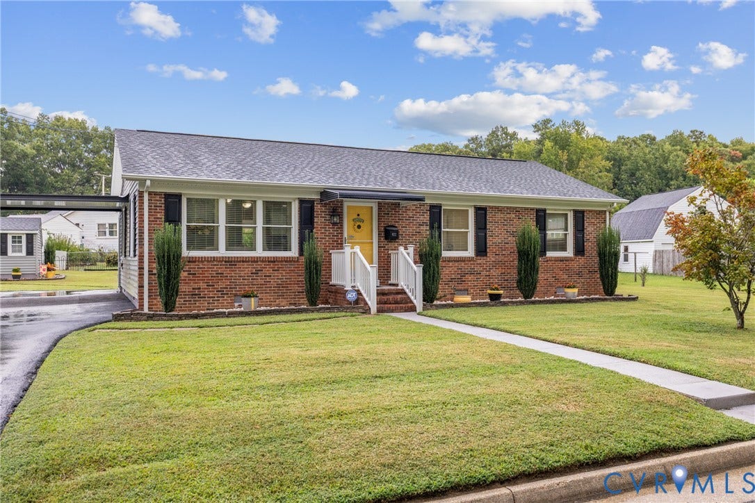 822 Old Town Drive, Colonial Heights, VA 23834 Brick exterior with a shingle roof and white trim