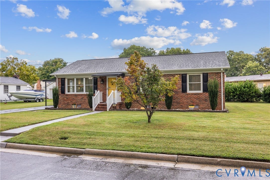 822 Old Town Drive, Colonial Heights, VA 23834 Brick exterior with a gray shingle roof