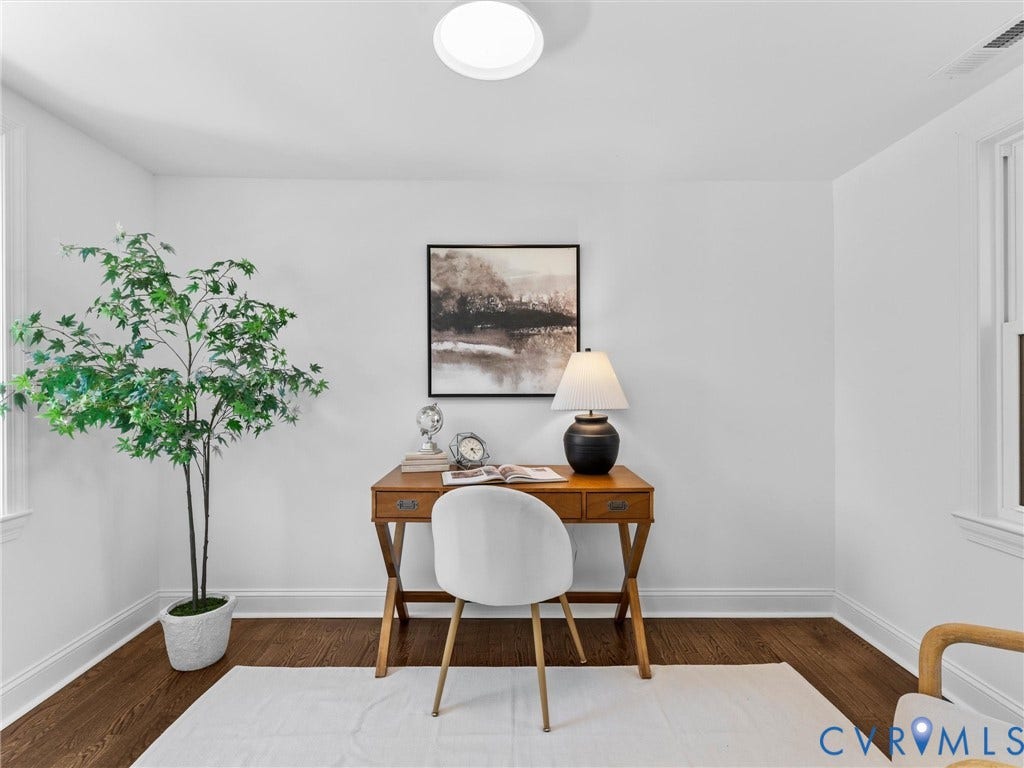 Hardwood flooring, white painted walls, recessed lighting, and white window trim