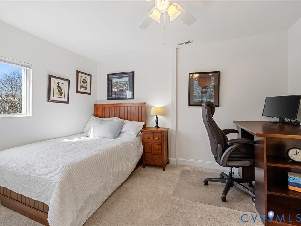 2021 Venable Street, Union Hill, Richmond, VA 23223 Bright room with a window, ceiling fan, and carpeted flooring