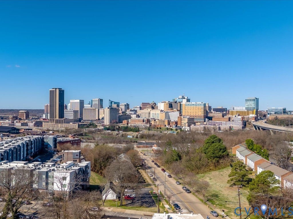 2021 Venable Street, Union Hill, Richmond, VA 23223 Expansive cityscape with prominent high-rise buildings and visible infrastructure
