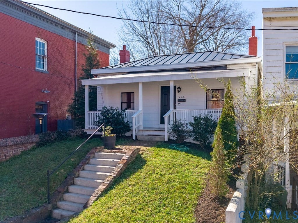2021 Venable Street, Union Hill, Richmond, VA 23223 White exterior with a covered front porch and metal roof