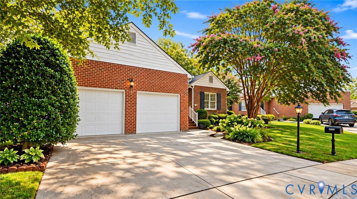5500 Lakemere Drive, 55+ Community, North Chesterfield, VA 23234 Brick exterior with white siding accents and a two-car garage