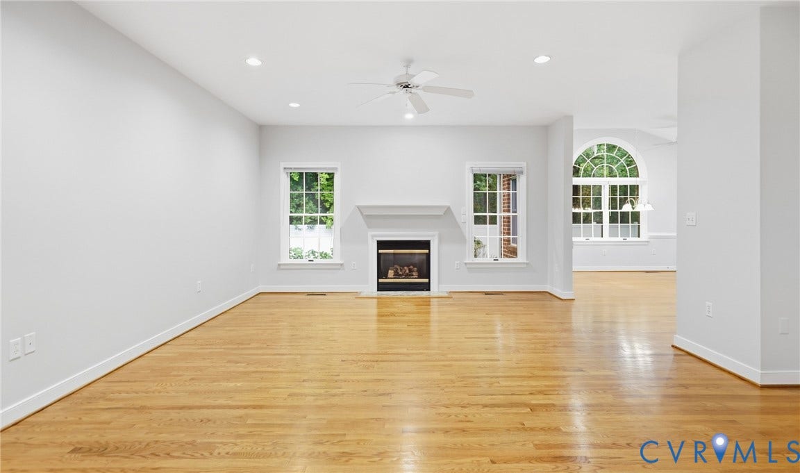 5500 Lakemere Drive, 55+ Community, North Chesterfield, VA 23234 Hardwood flooring throughout, recessed lighting, ceiling fan, and a fireplace with a mantel