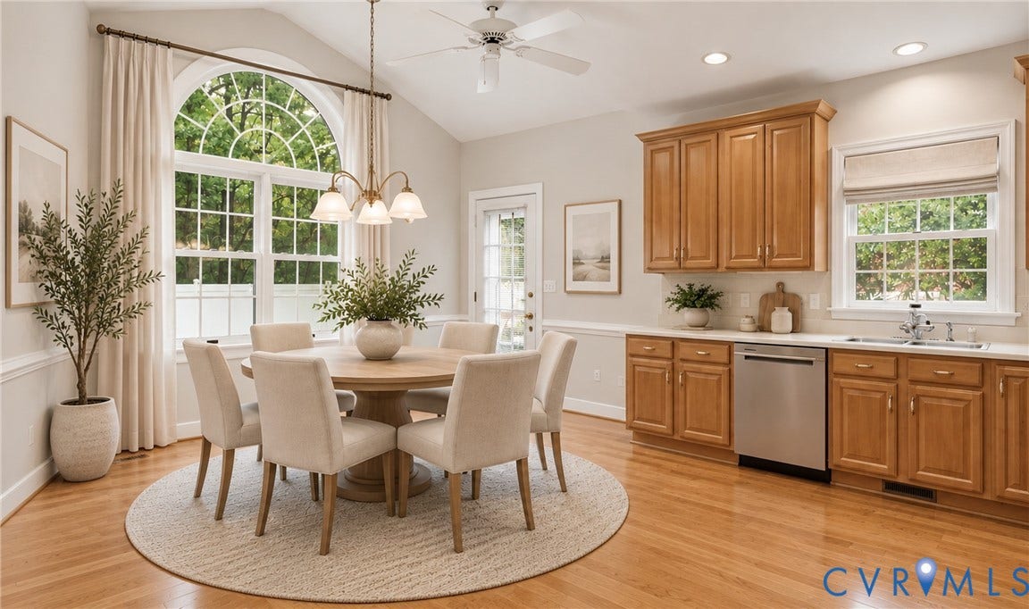 5500 Lakemere Drive, 55+ Community, North Chesterfield, VA 23234 Arched window with transom details, vaulted ceiling, wood-finish flooring, wood cabinetry, and stainless steel appliances