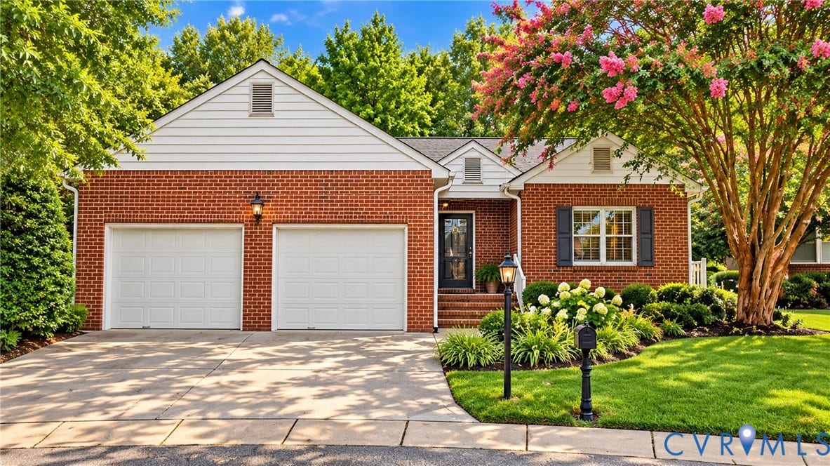 5500 Lakemere Drive, 55+ Community, North Chesterfield, VA 23234 Brick exterior facade with white siding accents and a two-car garage