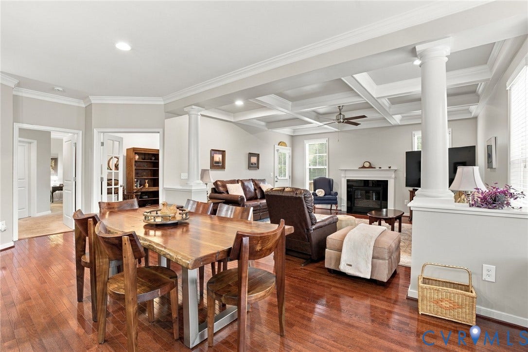 Hardwood flooring extends throughout the main living areas