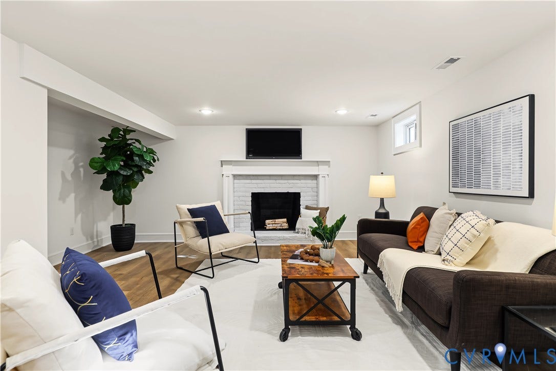 702 Westham Parkway, Westham, Henrico, VA 23229 Wood-finish flooring, recessed lighting, white brick fireplace with a white mantel, and white walls