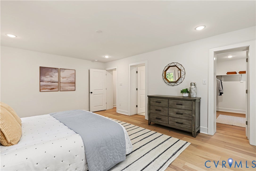 702 Westham Parkway, Westham, Henrico, VA 23229 Recessed lighting, light wood-finish flooring, white walls, and a walk-in closet with built-in shelving