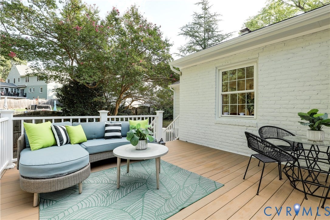 702 Westham Parkway, Westham, Henrico, VA 23229 Expansive outdoor deck featuring wood-finish flooring, white railing, and a white brick exterior
