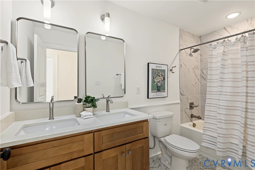 702 Westham Parkway, Westham, Henrico, VA 23229 Dual vanity with wood-finish cabinetry and rectangular undermount sinks
