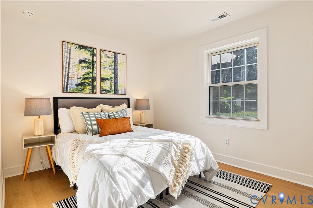 702 Westham Parkway, Westham, Henrico, VA 23229 Wood-finish flooring with a white trim, a single window with grids, and light-toned wall paint