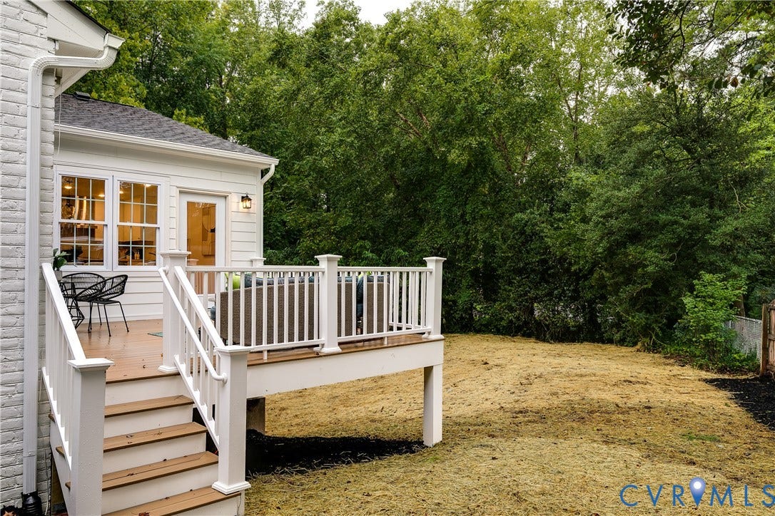 702 Westham Parkway, Westham, Henrico, VA 23229 Expansive rear deck featuring white railings, wood-finish stairs, and a solid exterior door