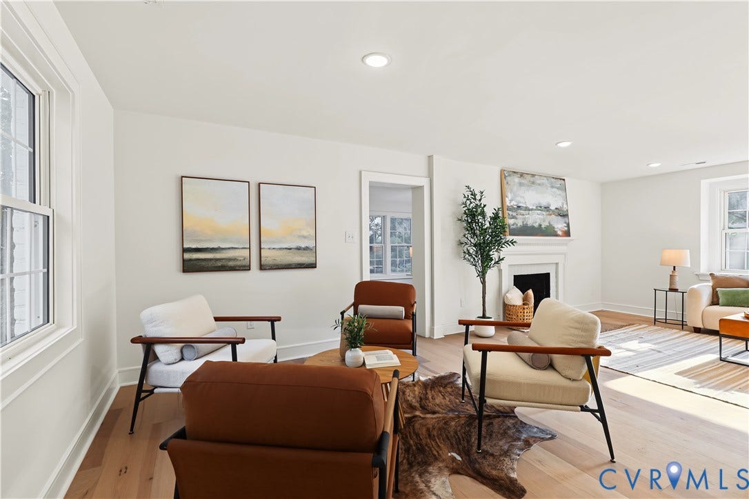 702 Westham Parkway, Westham, Henrico, VA 23229 Recessed lighting, wood-finish flooring, white walls, white trim, and a built-in fireplace with white mantel