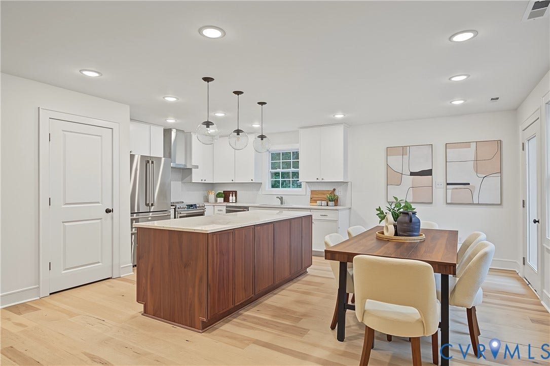 702 Westham Parkway, Westham, Henrico, VA 23229 Kitchen featuring white cabinetry, stainless steel appliances, a wood-finish island with a light-toned countertop, recessed lighting, and wood-finish flooring