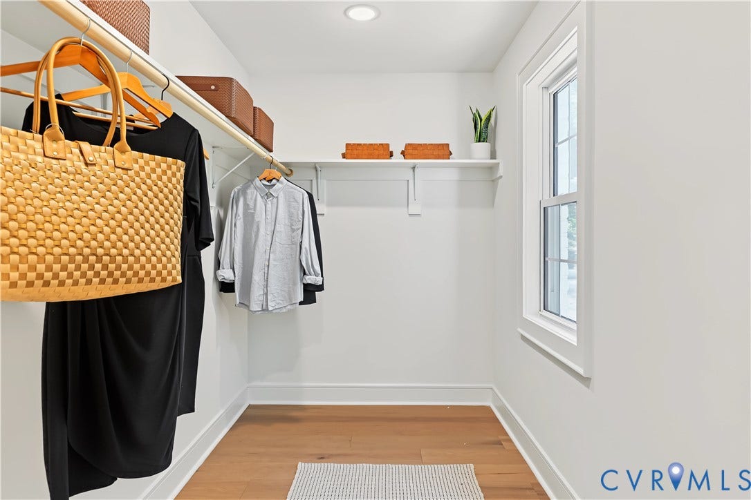 702 Westham Parkway, Westham, Henrico, VA 23229 Walk-in closet featuring wood-finish flooring, recessed lighting, a built-in window, and ample shelving with hanging rods
