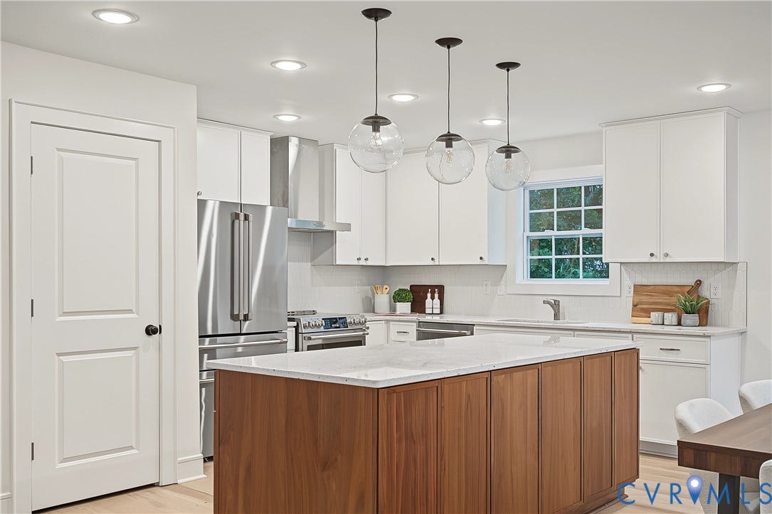 702 Westham Parkway, Westham, Henrico, VA 23229 Kitchen featuring stainless steel appliances, white cabinetry, a wood-finish island with a light-toned countertop, and recessed lighting