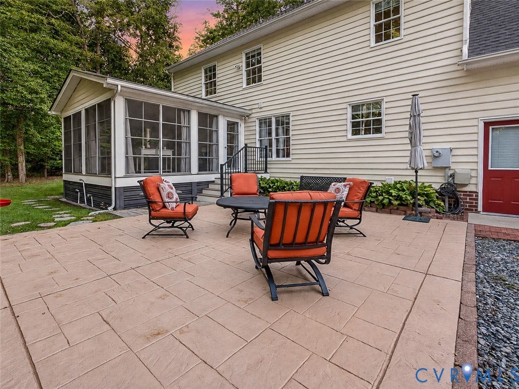 4013 Tweedsmuir Road, Moseley, VA 23120 the 20x20 patio for dinner beneath the evening sky.