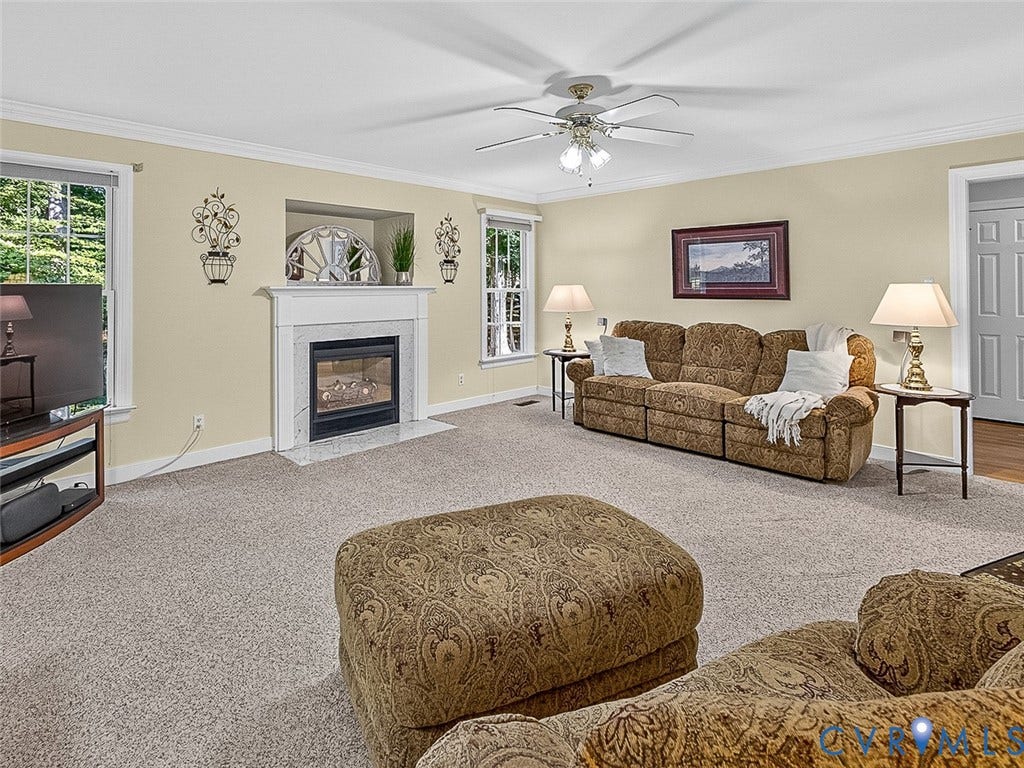 4013 Tweedsmuir Road, Moseley, VA 23120 Settle in beside the gas fireplace in the 18x16 family room with crown molding, nature view and access to sun room