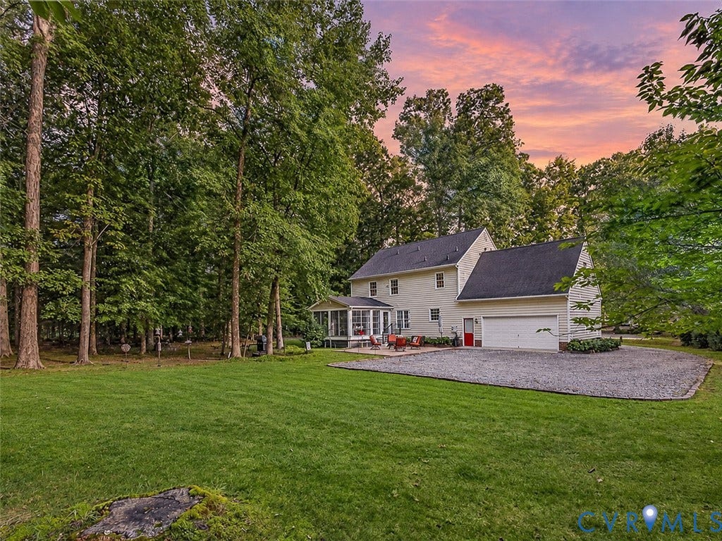 4013 Tweedsmuir Road, Moseley, VA 23120 The private backyard offers space to garden, gather, and enjoy visiting wildlife.