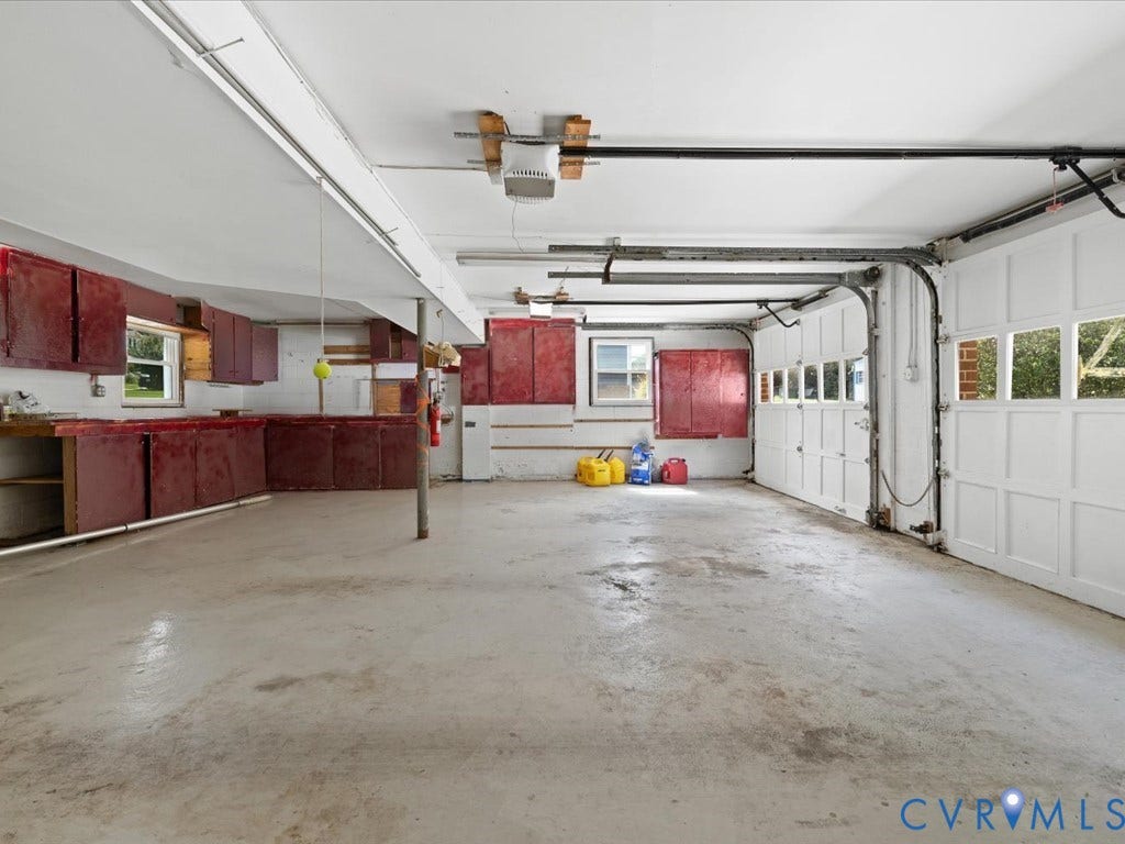 Oversized 2-car garage with workshop area