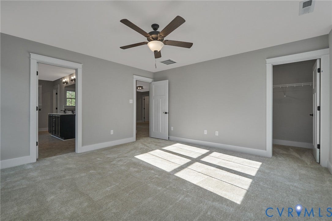 11121 Somerset Hill Drive, Somerset Hills, Glen Allen, VA 23059 Neutral gray wall tones with white trim, soft gray carpeting, and a ceiling fan with integrated lighting