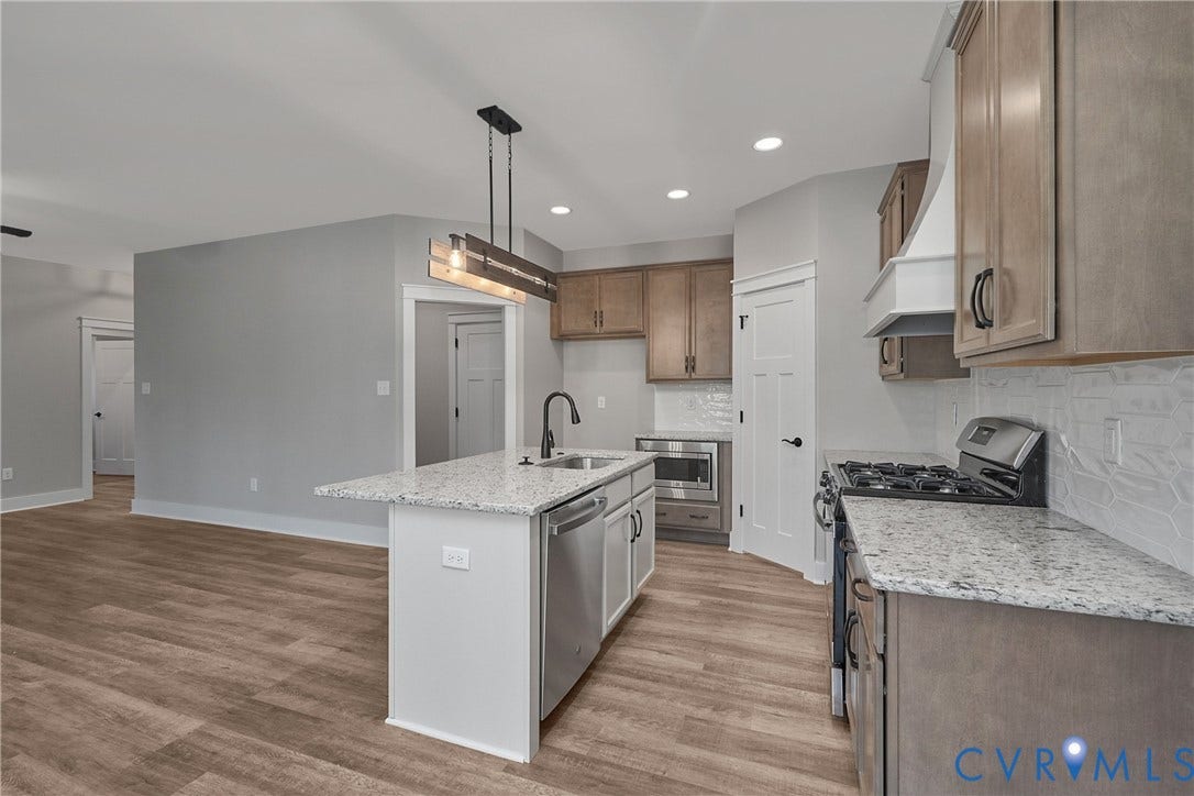11121 Somerset Hill Drive, Somerset Hills, Glen Allen, VA 23059 Kitchen featuring wood-finish flooring, granite countertops, stainless steel appliances, and wood cabinetry