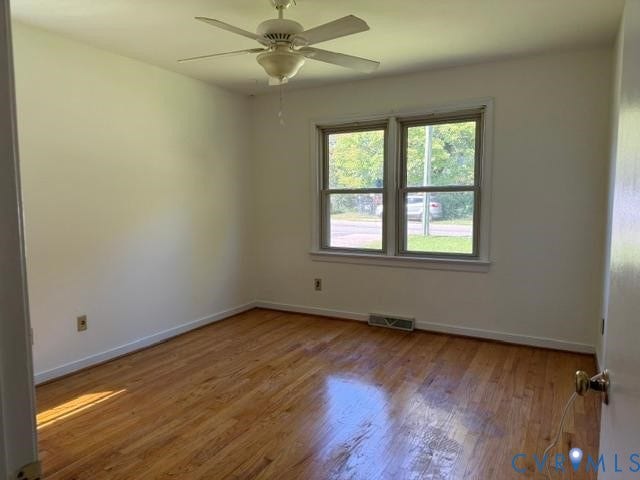 2109 Parkside Avenue, Lakeside, Henrico, VA 23228 Hardwood flooring, white walls, double window, and ceiling fan